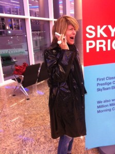 Linda realizes our flight to Paris has been cancelled.