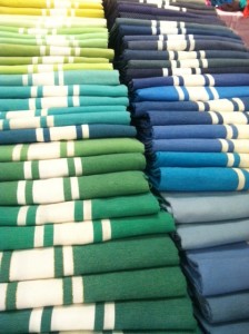 A rainbow of our spring and summer must-have product at Huff Harrington Home: foutas.
