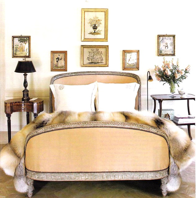 Suzanne Rheinstein puts mismatched nightstands on either side of the bed for a nice, collected look.