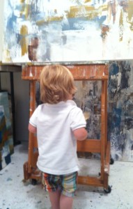 Melissa's precious little son, Payne, takes a look at one of his Mommy's paintings.