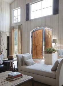 Crunchy walls and distressed wood scream for clean and simple furnishing. From Pinterest.