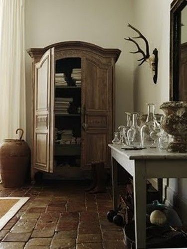 One of our favorite bloggers, Sharon Santoni, shared this image of a French interior with a gorgeous 17th C. Biot propped simply next to a Louis Philippe armoire.