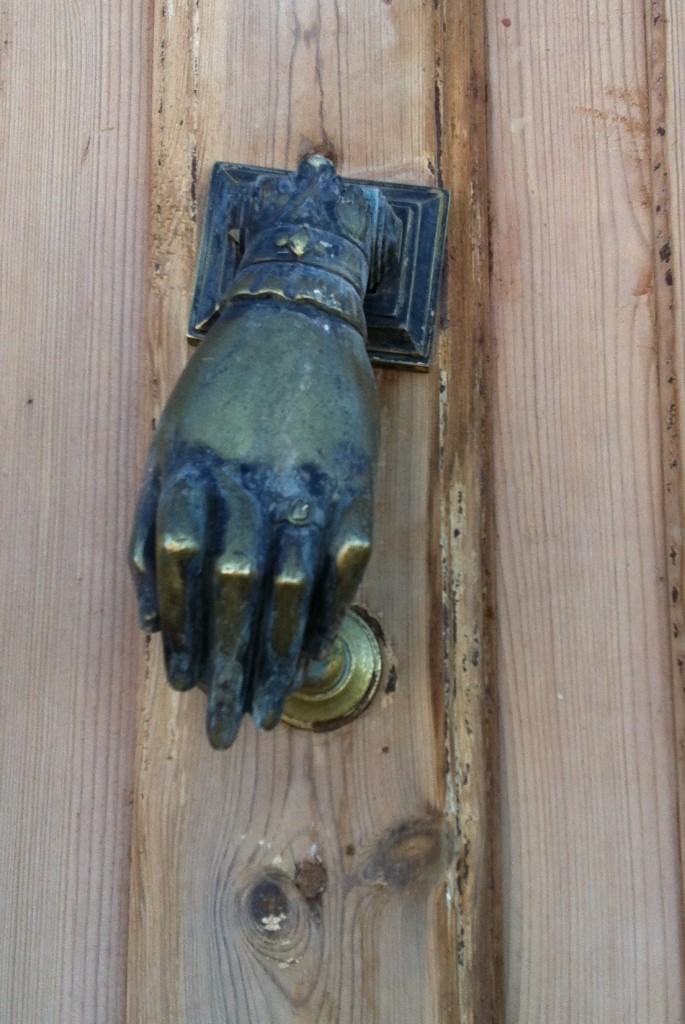 We're crazy about this adorable door knocker...and the 13-foot door it was attached to.