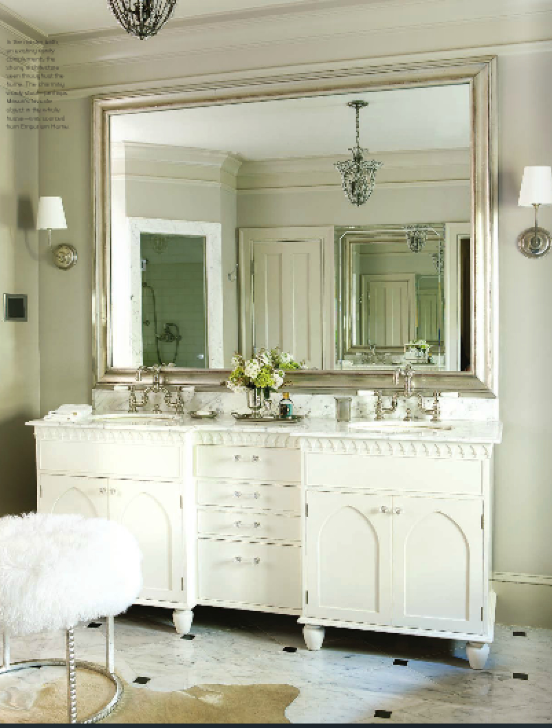 Ever so glam, the master bath is a study in lights, whites, shimmer and shine.