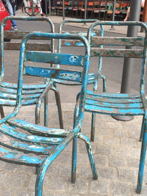 Blue chairs at Les Puces.