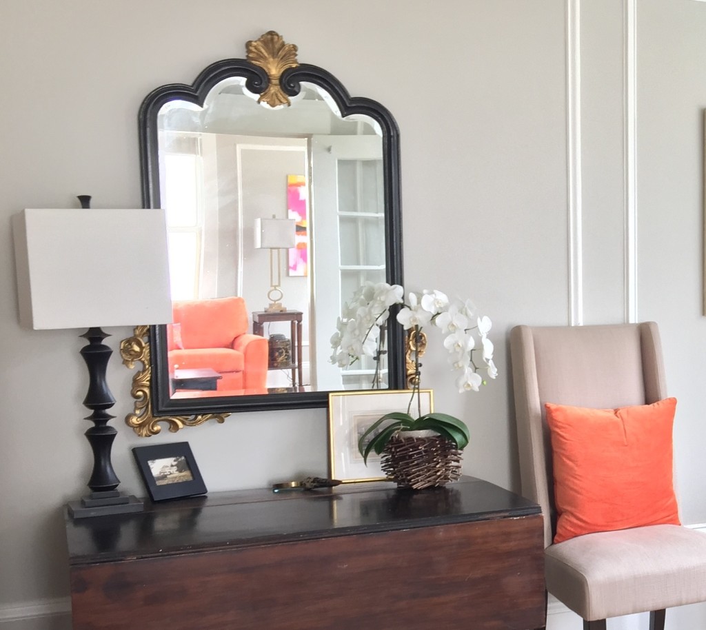And we added touches of orange in the more neutral dining room, to echo the couch.