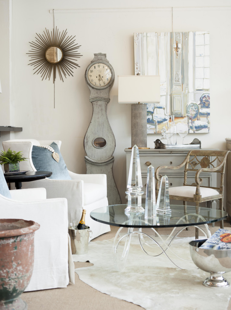 Here's one of our babies taking center stage next to a sexy acrylic table and sleek club chairs.