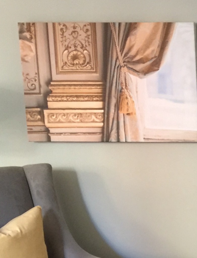 Our client's inspirational artwork that drove the gold and grey color scheme in the main living areas of the home