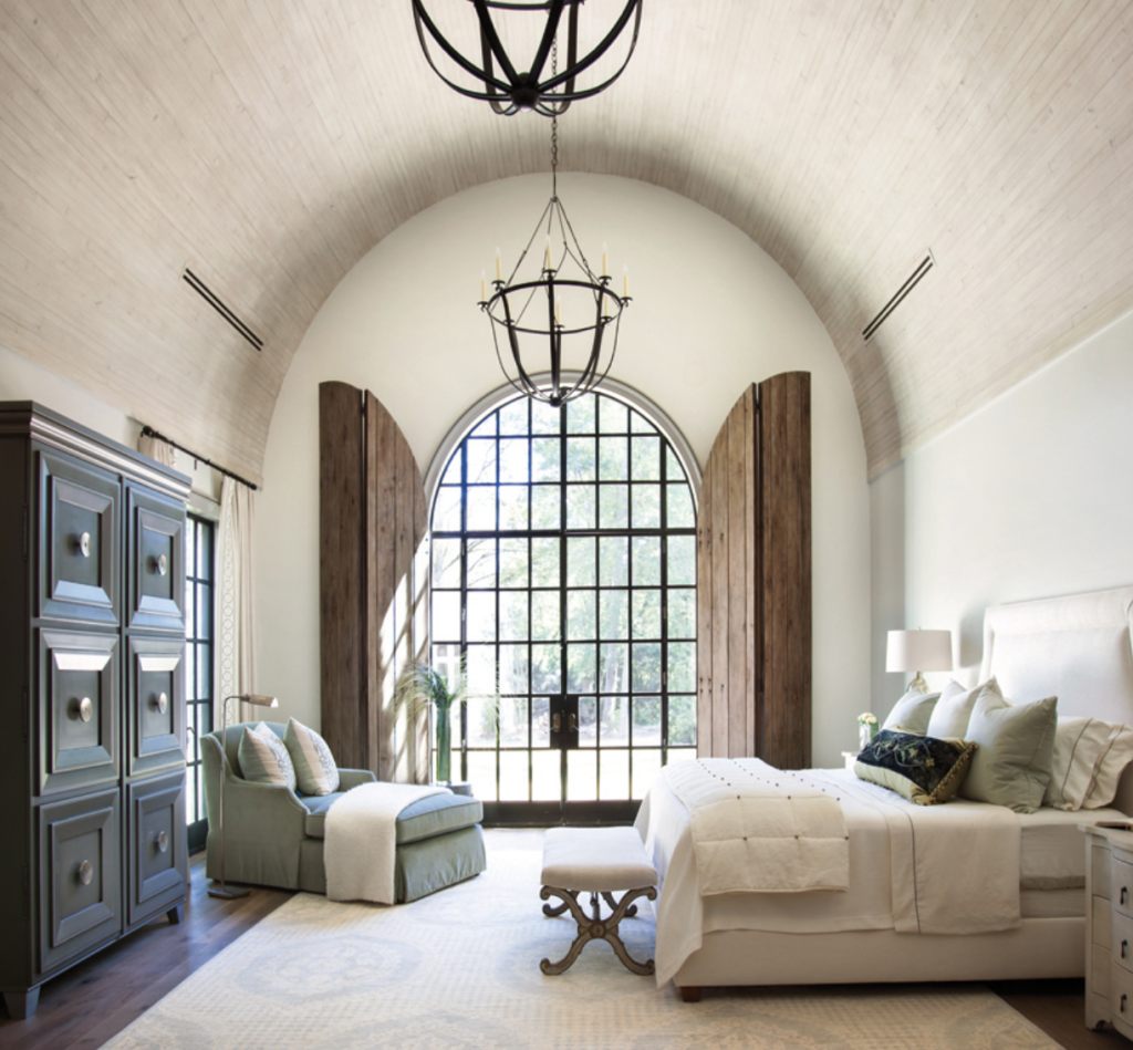 The master bedroom. The giant wood shutters are so beautifully constructed that you can literally use a finger to close them.