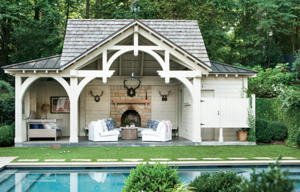 I could be interested in a pretty pool and matching poorhouse (Atlanta Homes and Lifestyles/Erica George Dines.)