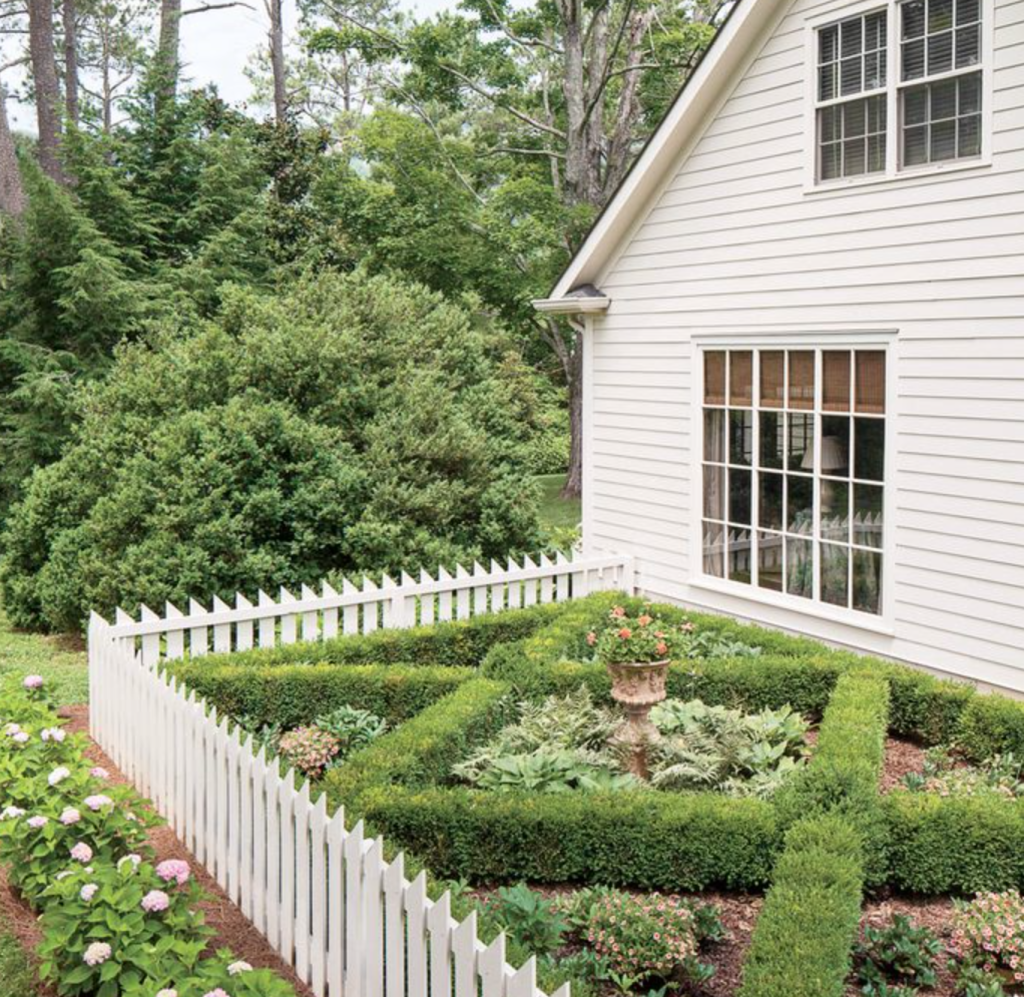 Can I please also have a darling little herb garden with a white picket fence and a boxwood design? (From Southern Living and photographer Lisa Romerein.)