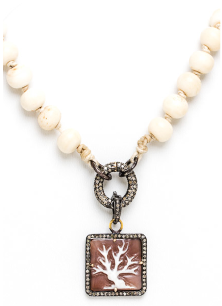 Cindy's gorgeous Tree of Life cameo. Hand-carved with a pave diamond bezel setting and a coffee-stained white bone bead chain. LOVE!