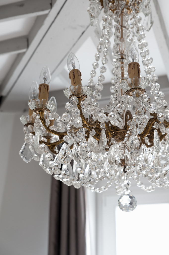 ... and in the sparkle of gorgeous crystal chandelier.
