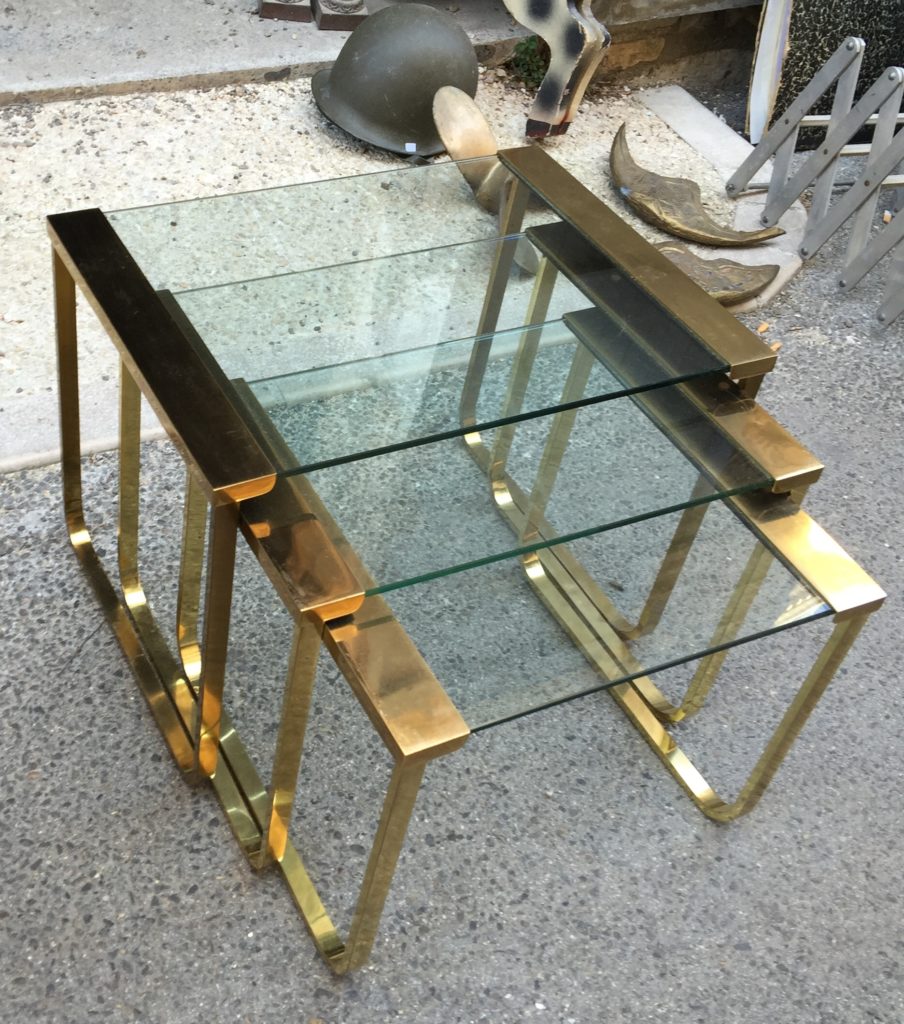Or the coolest 1950's brass and glass nesting tables ...