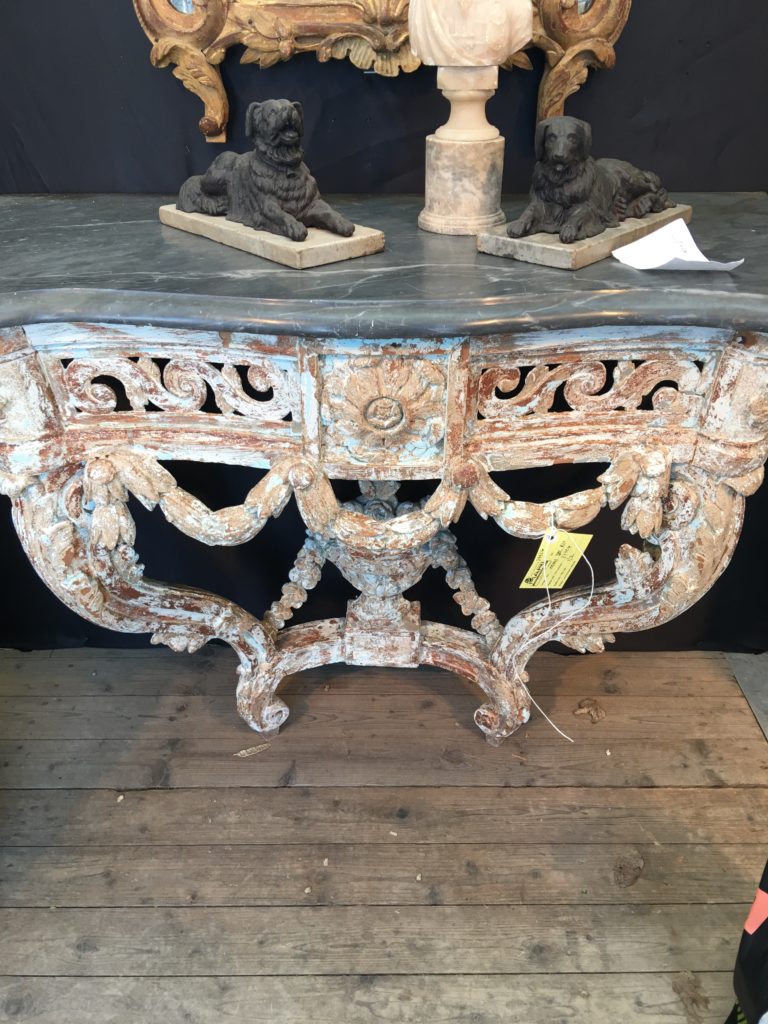 A handsomely carved 18th C. console